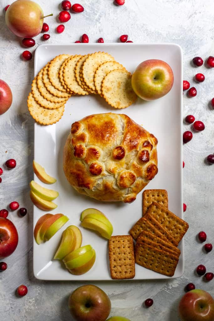 Cranberry Baked Brie with crackers and apples