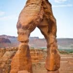 If you're headed to Arches National Park, make sure to hike on the iconic Delicate Arch trail! This extra-popular spot can be crowded, so check out our tips on the best times to visit.