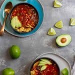 This spicy vegan tortilla soup is made with peppers, tomatoes, spices, and a beer broth. Make it in your Instant Pot or on the stovetop!