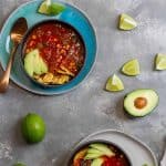 This spicy vegan tortilla soup is made with peppers, tomatoes, spices, and a beer broth. Make it in your Instant Pot or on the stovetop!