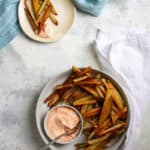 crispy oven fries in a serving dish
