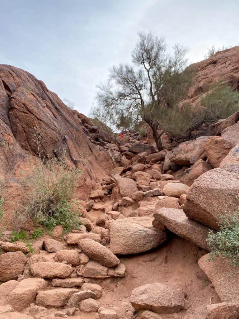 Hiking path on Camelback mountain with rock scrambling section.