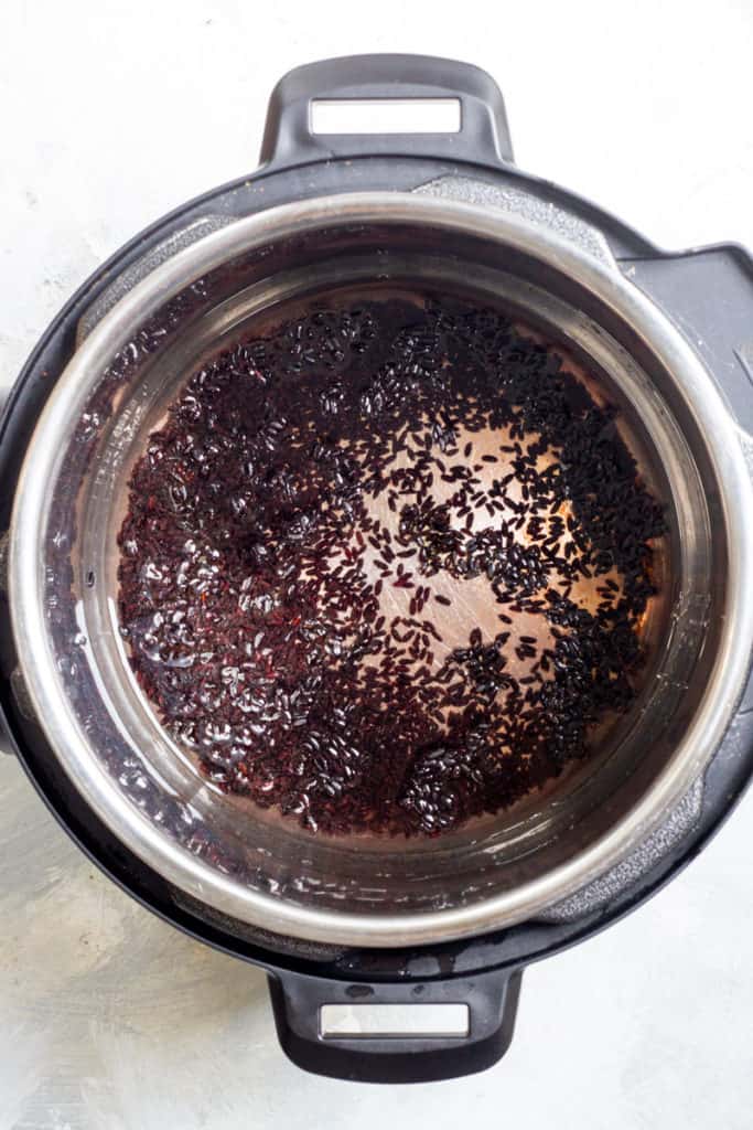 Add Black Rice, Water, Oil + Salt to Pressure Cooker