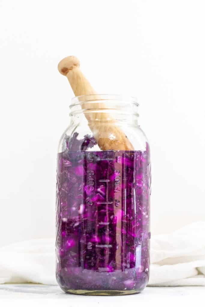 Add to Jar or Crock, Then Press the red Cabbage Until It’s Covered with Liquid.