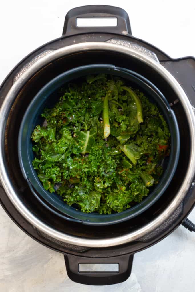Add Half the Seasoned Kale to the Air Fryer