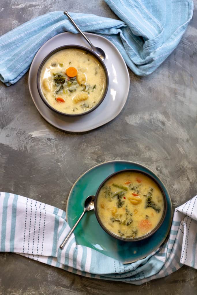 vegetable gnocchi soup in serving bowls