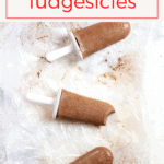 These easy homemade fudgesicles are made with sugar, cocoa powder, milk, and yogurt for a delicious frozen treat. For an extra-fabulous dessert, add a little bourbon!