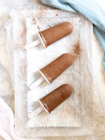 Homemade fudgesicles on a serving tray
