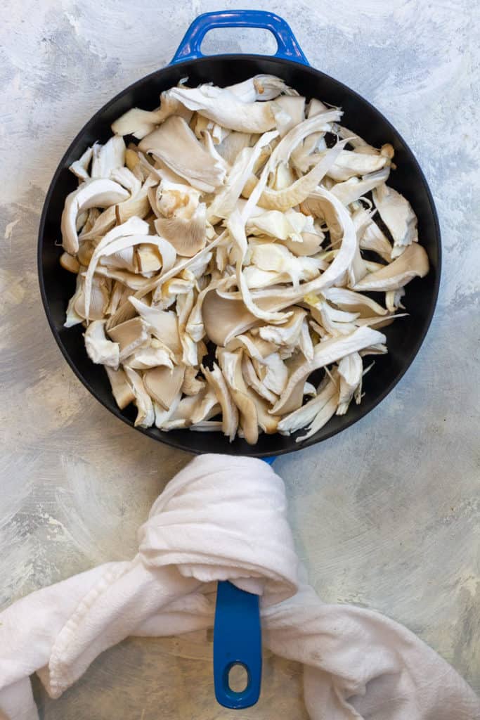 Add the Mushrooms to a Large Pan.
