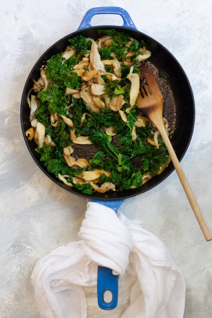 Add Greens to mushroom salad + Wilt.