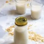 oat coconut milk in a milk jar