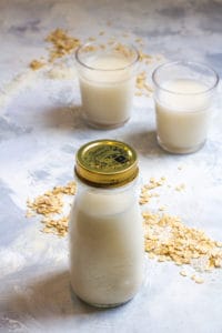oat coconut milk in a milk jar