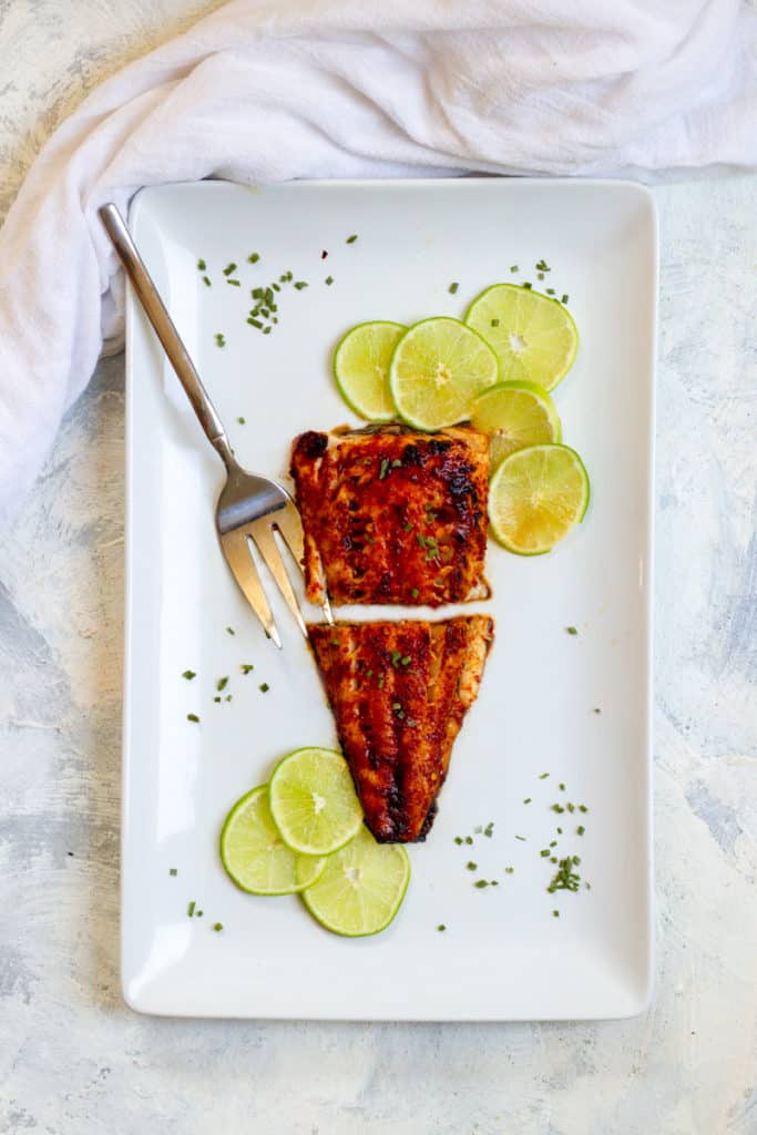 broiled black cod on a serving dish