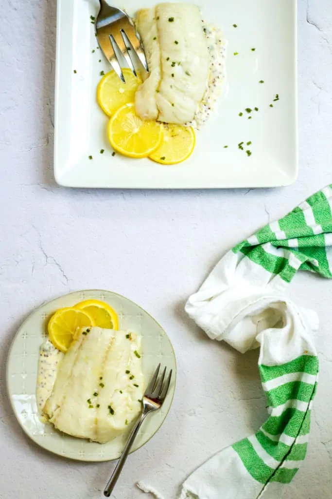 broiled cod on a serving tray