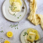 Broiled Halibut with Lemon Sauce on Plates