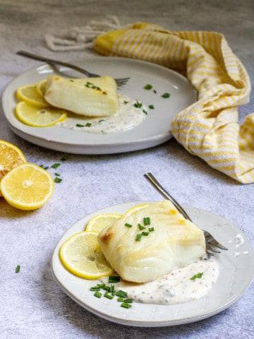 Broiled Halibut with Lemon Sauce on Plates