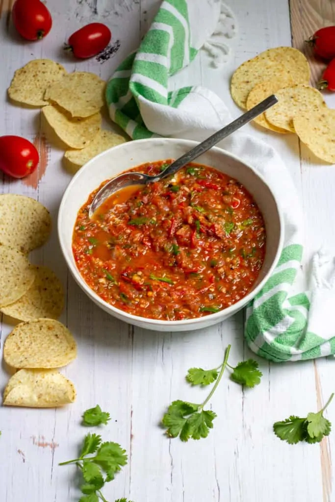 fire-roasted salsa in a bowl with chips on the side