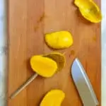Scoop Out The Mango Halves