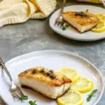 Pan-Seared Halibut with Lemon Caper Sauce on Plates