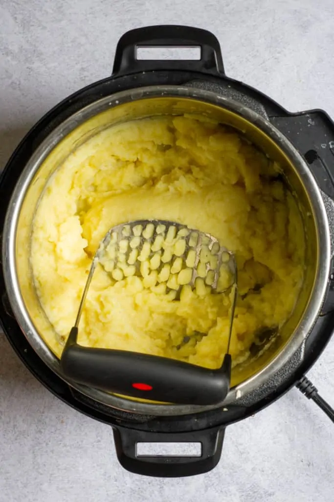 Mash Potatoes with a Ricer or Masher