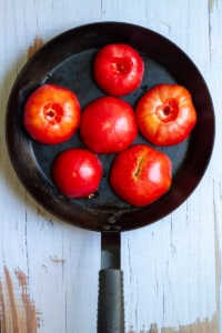 Place Tomatoes Cut-Side Down in an Oven-Safe Pan