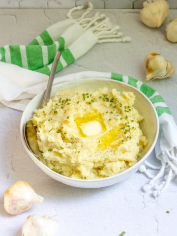 frenched mashed potatoes in a serving bowl