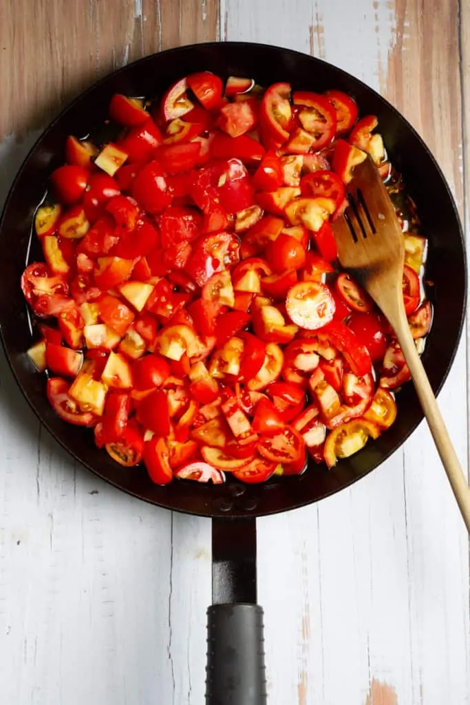 Add Tomatoes + Water to a Shallow Pan