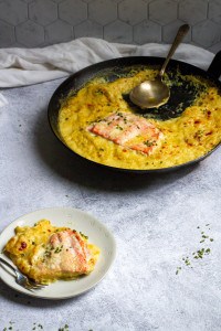 Salmon Spaghetti Squash Bake in a pan and on a plate