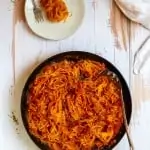 spaghetti squash marinara in a pan and on a plate