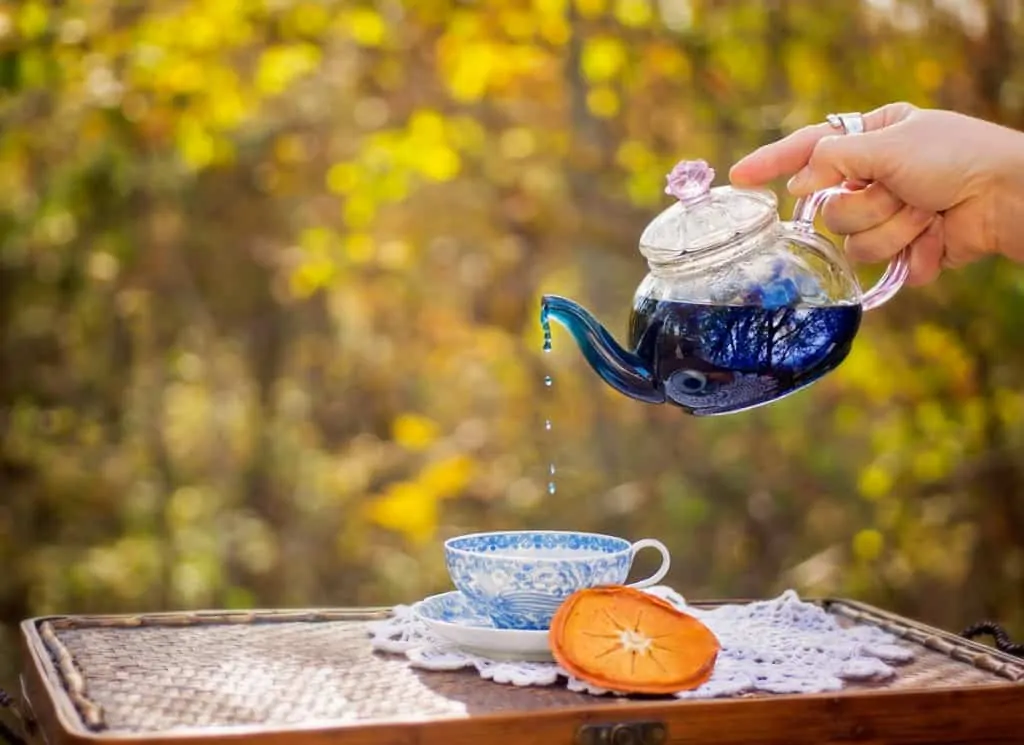 Pouring Herbal Tea.
