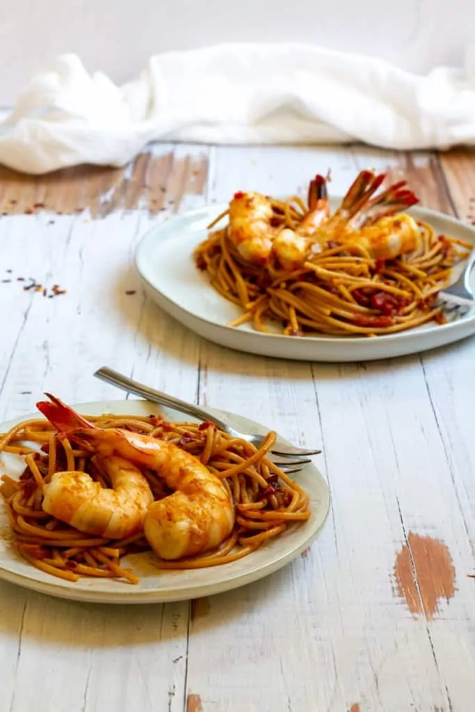 shrimp fra diavolo on plates.