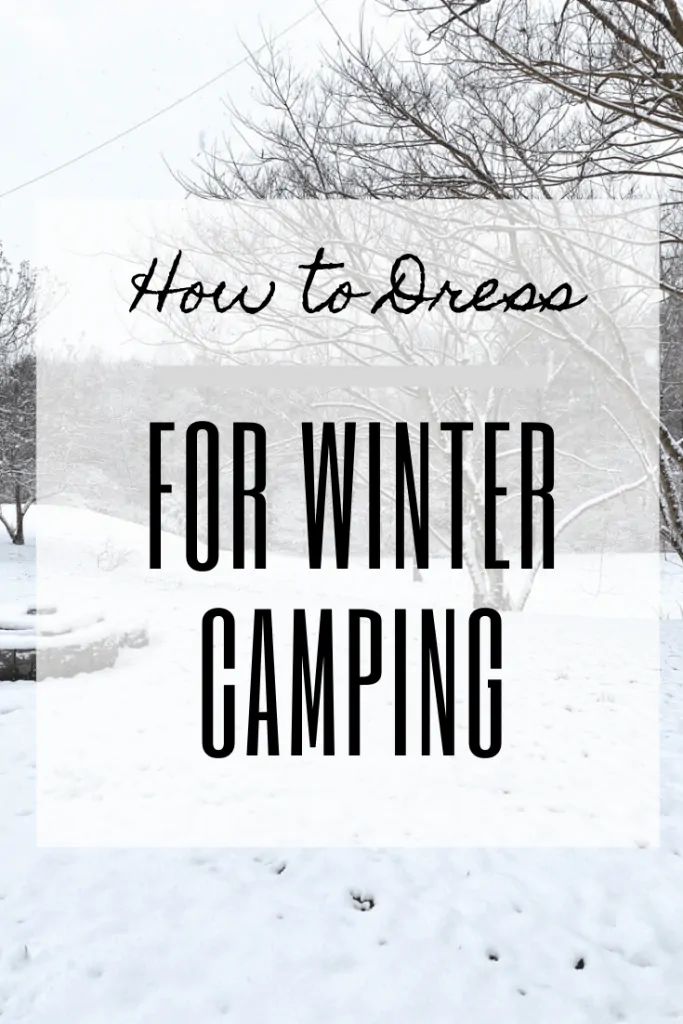 Snowy scene with text overlaid saying "How to Dress for Winter Camping".