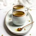 chamomile lavender tea in mugs with honey on a spoon