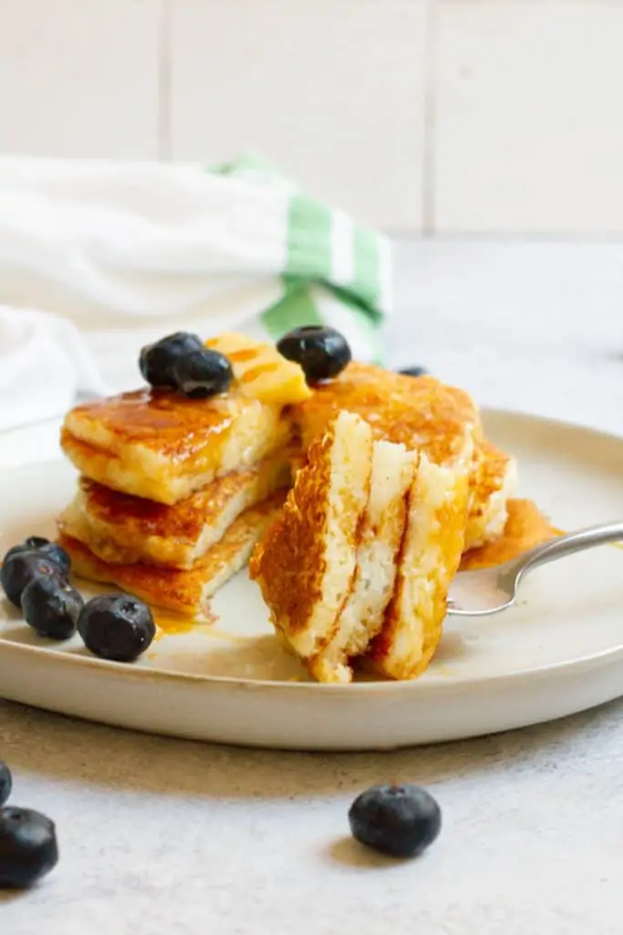 fluffy gluten-free sourdough pancakes on a plate