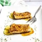 pan-seared black cod (sablefish) with brown butter sauce on a serving platter