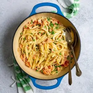 smoked salmon fettuccine alfredo in a serving bowl