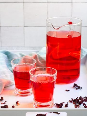 cold-brew hibiscus tea in a pitcher and in glasses