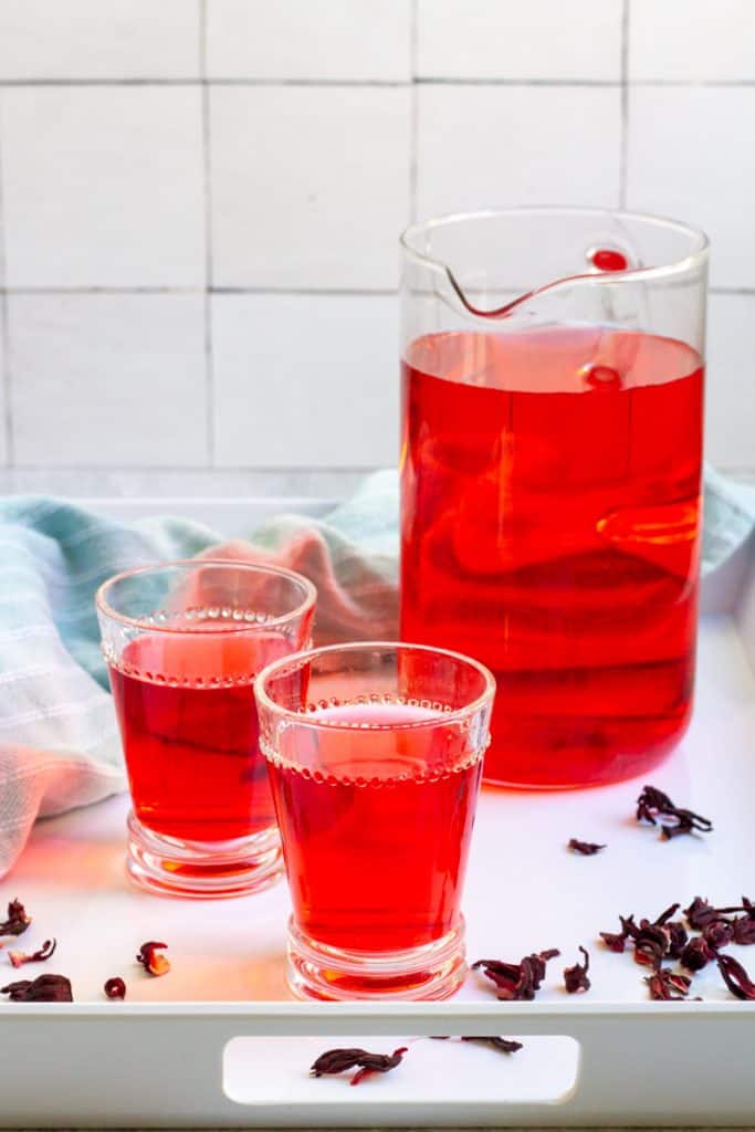 cold-brew hibiscus tea in a pitcher and in glasses