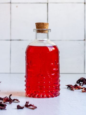 hibiscus simple syrup in a bottle