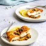 pan-seared grouper with butter caper sauce on plates