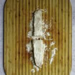 fish fillets dusted in flour.