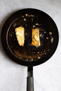 Flip Haddock + Top with Butter
