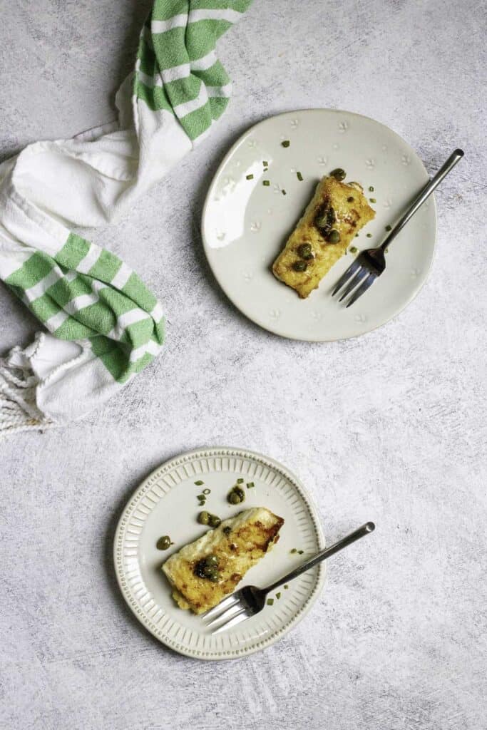 pan seared haddock on plate.