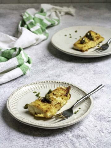 pan seared haddock on plate.