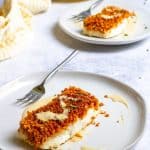 panko crusted halibut on plates with tahini sauce