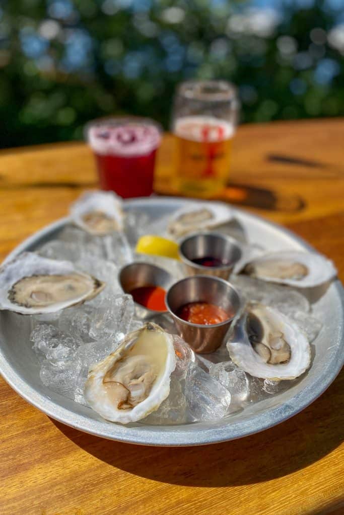 Raw Oysters, Blueberry Margarita + Maine Beer.
