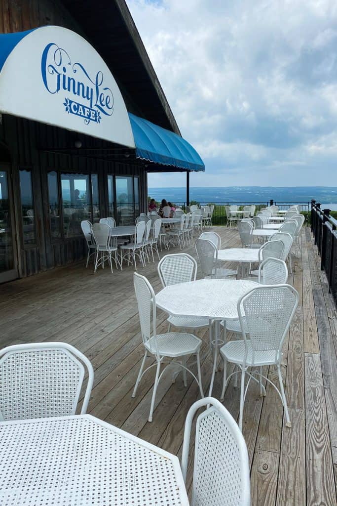 Ginny Lee Cafe deck with tables and chairs overlooking lake