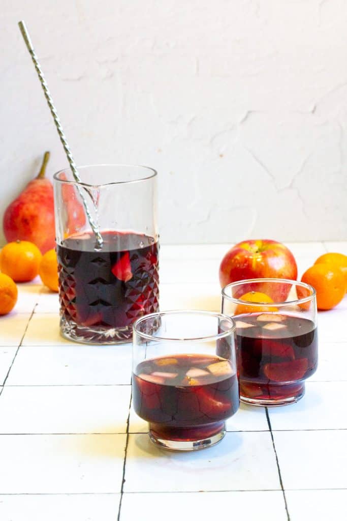 bourbon sangria in pitcher and glasses.
