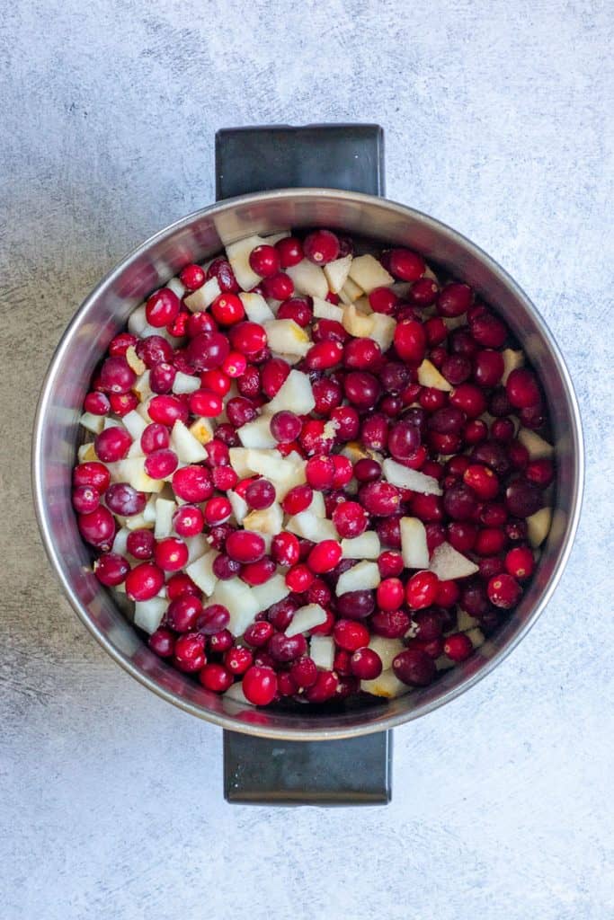 Pears + cranberries in a pot.