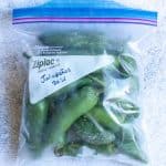 Whole jalapenos in a freezer bag.